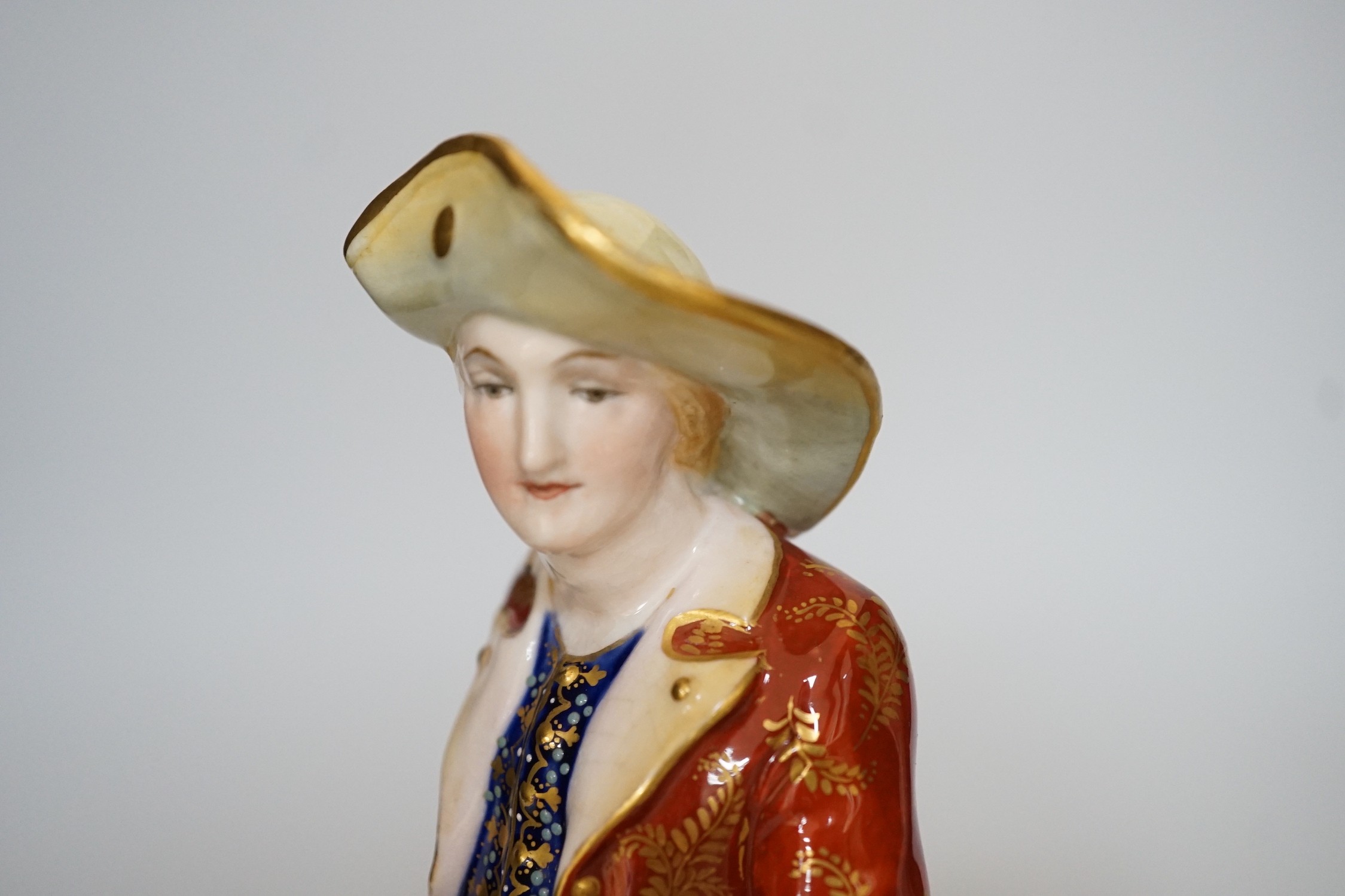 A pair of Royal Crown Derby figures of a Shepherd and shepherdess, 23cm